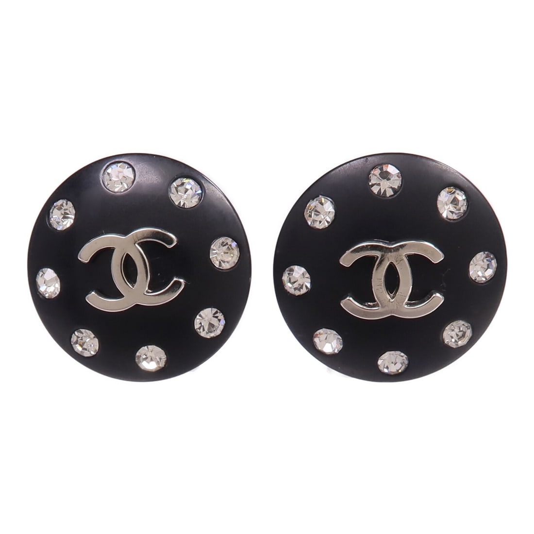 Chanel Black Metal CC Crystal Clip-On Earrings: Chanel Black Metal CC Crystal Clip-On Earrings These CHANEL CC clip-on earrings feature a black metal frame and the iconic CC logo embellished with crystals. Made in France, they are designed for non-