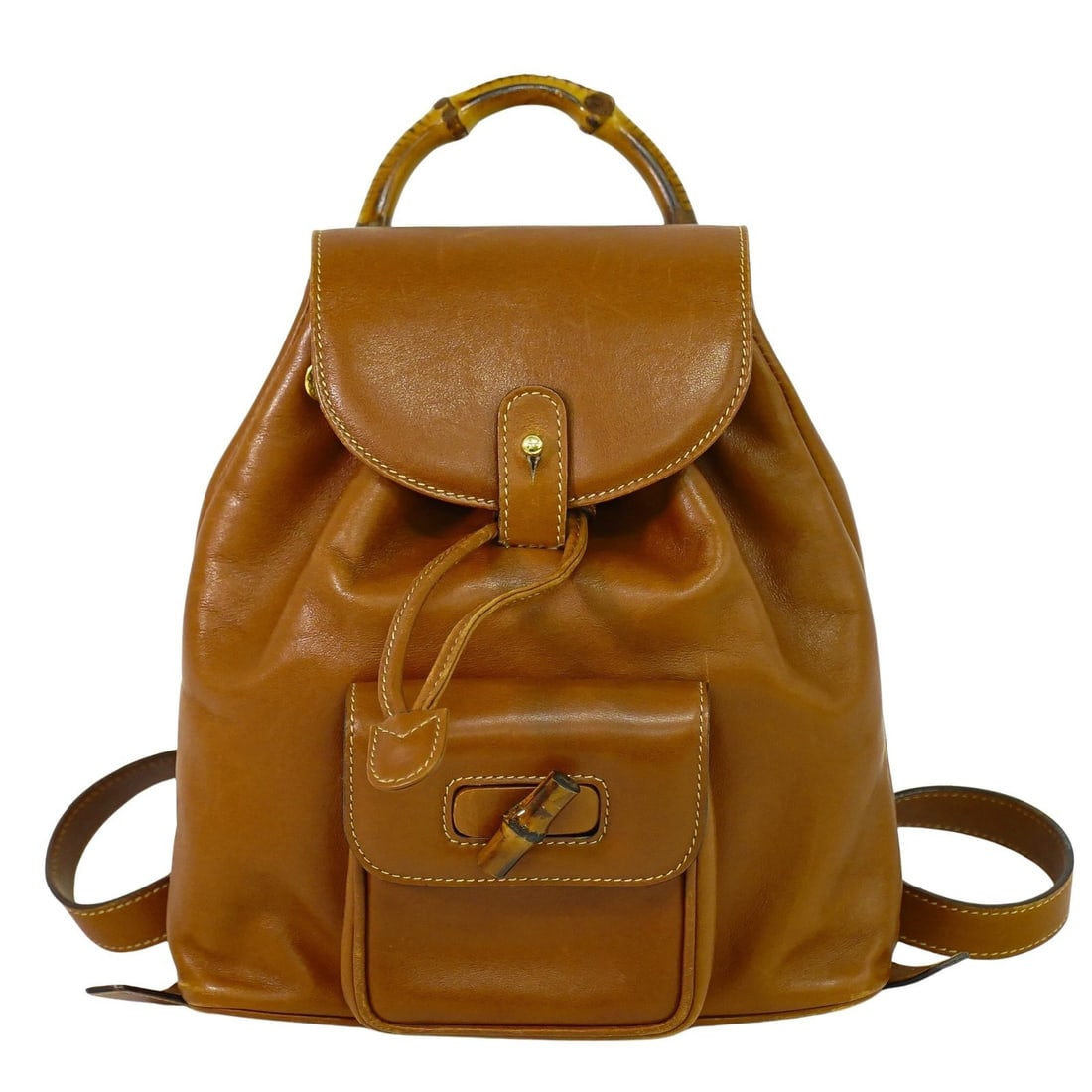 Gucci Leather Brown Bamboo Backpack Vintage 21cm by 23cm by 7cm: Gucci Leather Brown Bamboo Backpack Vintage 21cm by 23cm by 7cm This vintage Gucci bamboo backpack is crafted from brown leather, designed for women. It features a distinctive bamboo handle and a comp