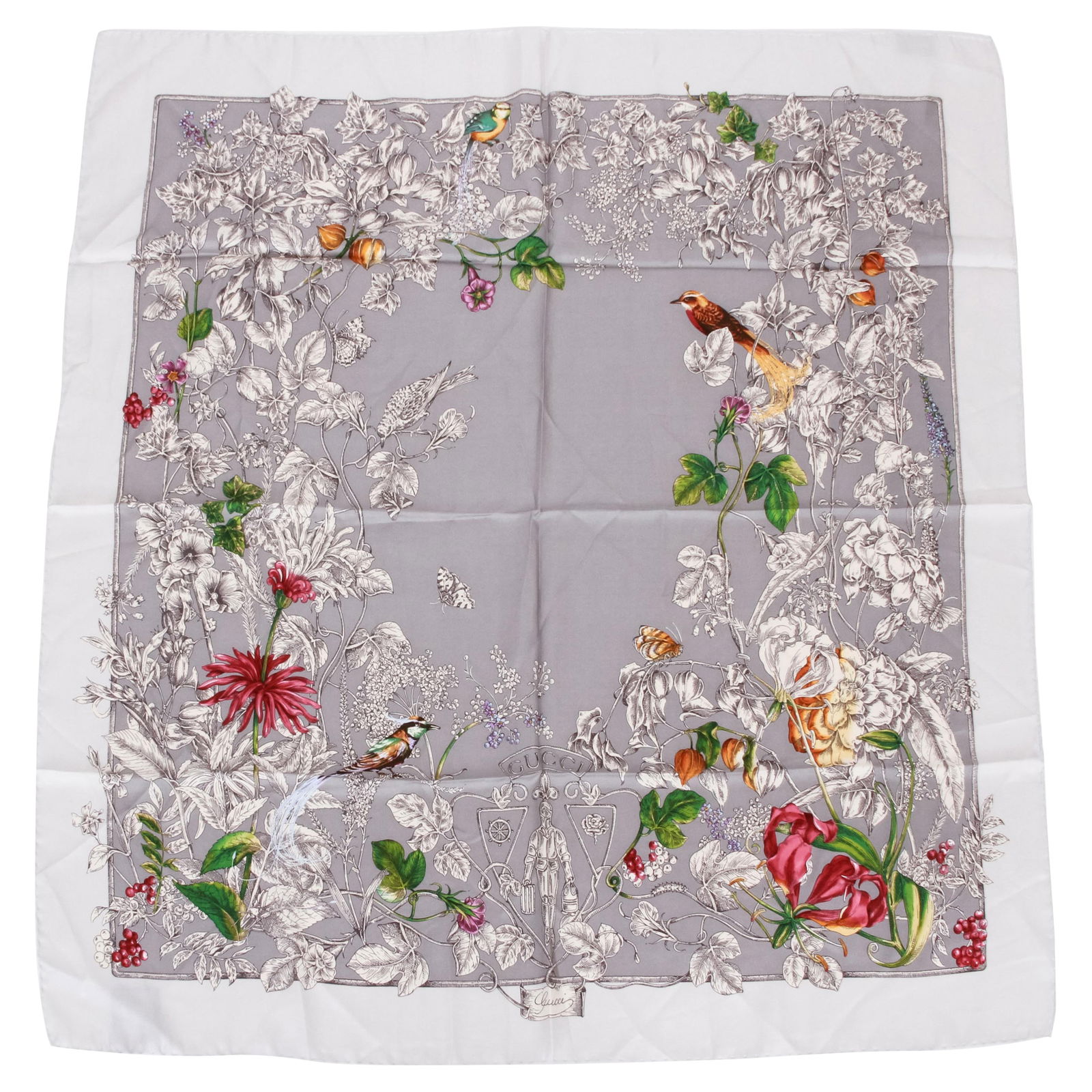 Gucci Gray Floral Scarf 100% Silk Made in Italy 35x35: Gucci Gray Floral Scarf 100% Silk Made in Italy 35x35 Elevate your accessory collection with this exquisite Gucci Gray Silk Floral Scarf. Crafted in Italy, this luxurious scarf features a delicate flo