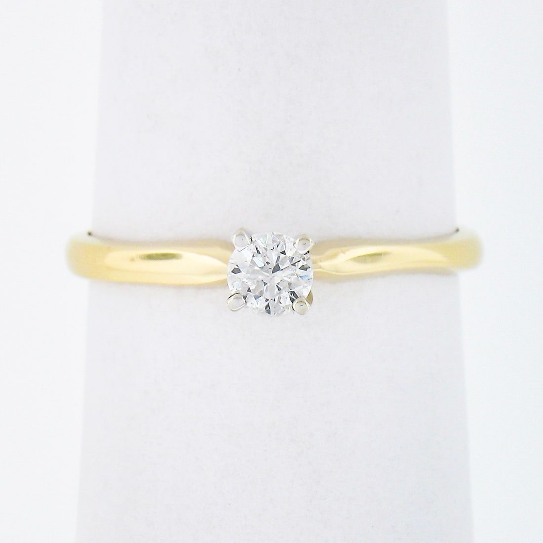 Classic 14k Two Tone Gold 0.20ctw Round Diamond Engagement Ring: Classic 14k Two Tone Gold 0.20ctw Round Diamond Engagement Ring This exquisite Classic 14k Two Tone Gold 0.20ctw 4-Prong Set Round Diamond Solitaire Engagement Ring is a timeless choice for your engag
