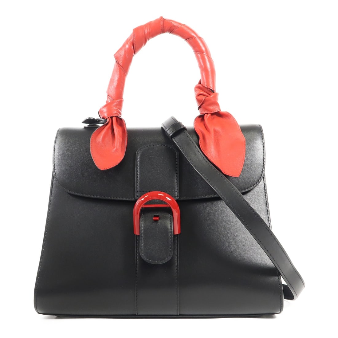 Delvaux Brillant MM 2 Way Shoulder Bag Black Red Calfskin: Delvaux Brillant MM 2 Way Shoulder Bag Black Red Calfskin Introducing the Delvaux Brillant MM 2 Way Bag, a stunning accessory crafted from premium calfskin leather in a sleek black exterior with a str