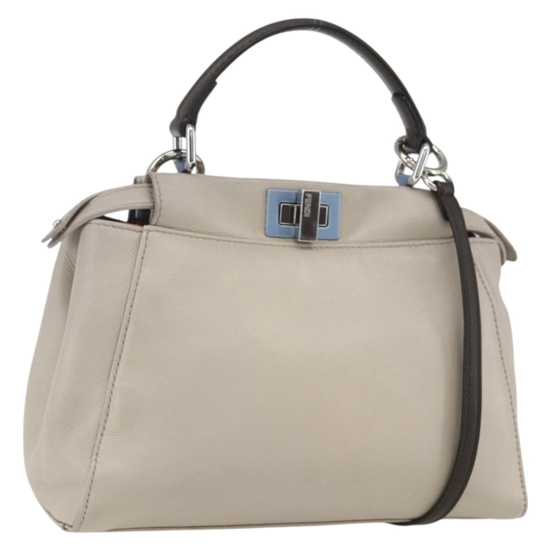 Beige Mini Peekaboo Leather Handbag with Shoulder Strap by FENDI: Beige Mini Peekaboo Leather Handbag with Shoulder Strap by FENDI This FENDI Mini Peekaboo handbag is crafted from beige leather with silver-tone accents. Designed for versatile use, it features both a