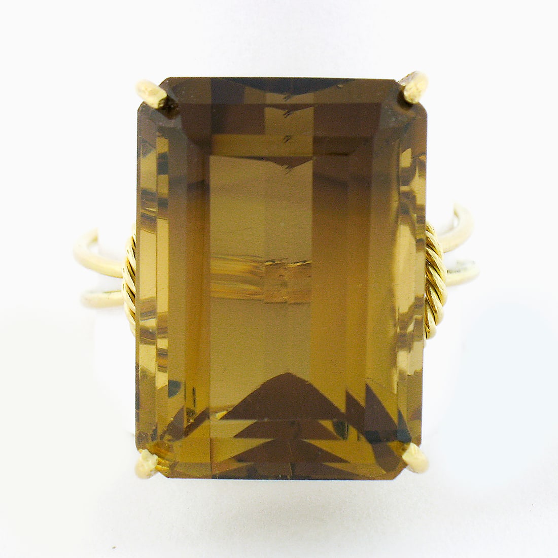 Vintage Handmade 18K Yellow Gold Smoky Quartz Cocktail Ring: Vintage Handmade 18K Yellow Gold Smoky Quartz Cocktail Ring This exquisite vintage handmade cocktail ring features a stunning large rectangular step cut smoky quartz, elegantly prong set in solid 18K