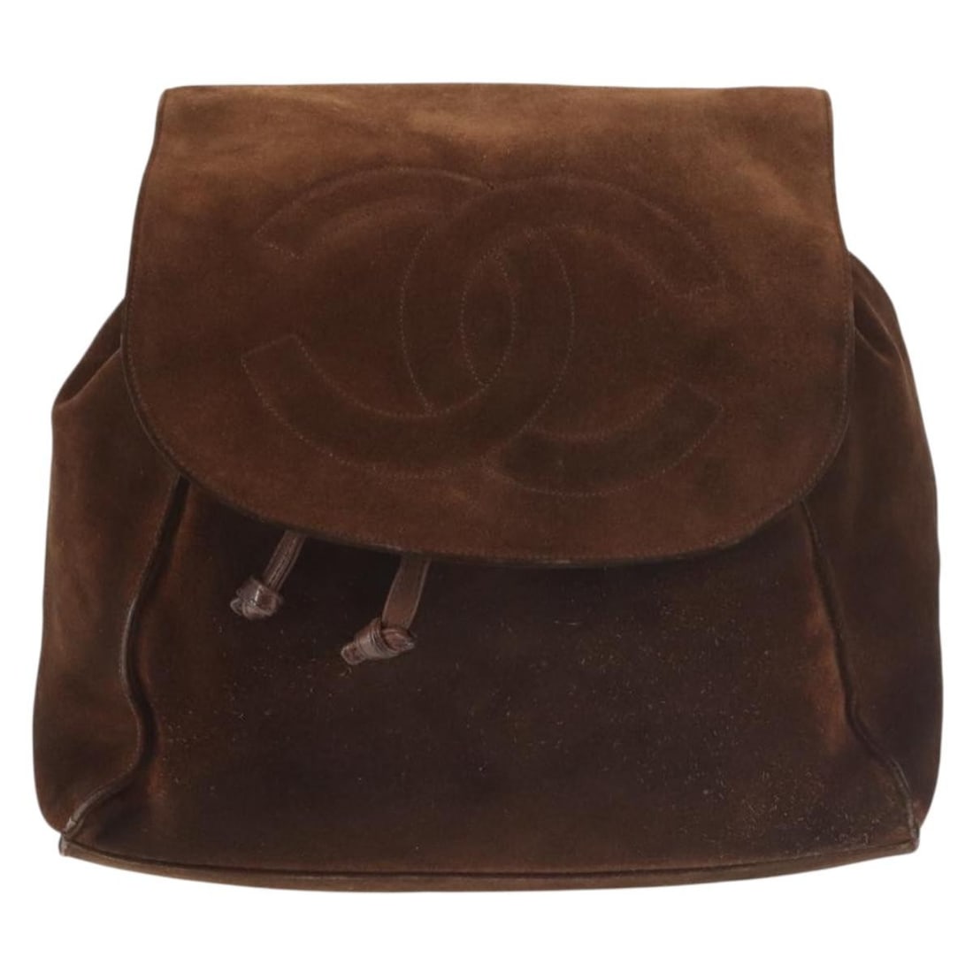 Brown Suede Chanel CC Flap Vintage Backpack Bag: Brown Suede Chanel CC Flap Vintage Backpack Bag This Chanel Vintage CC Flap Backpack is crafted from brown suede and features the signature CC flap design. Designed for female use, the backpack includ