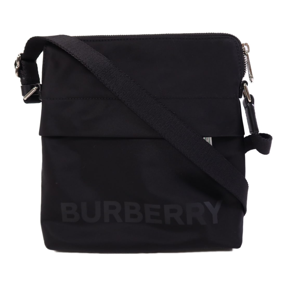 Black Nylon Burberry 8052253 Shoulder Bag with Silver Tone Hardware: Black Nylon Burberry 8052253 Shoulder Bag with Silver Tone Hardware This Burberry shoulder bag features a sleek black nylon exterior and offers a minimalist, versatile look. Crafted in the United King