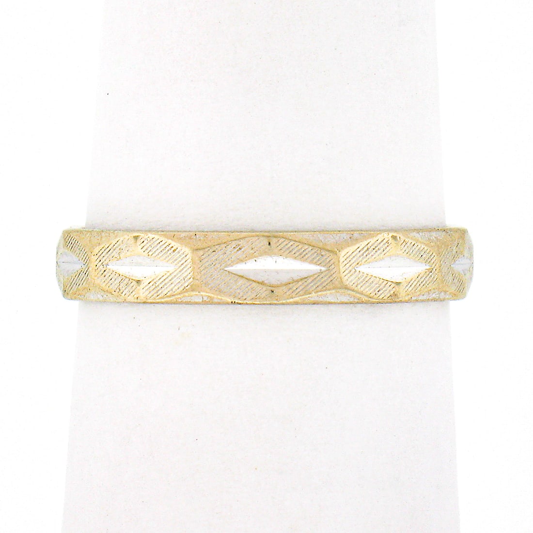 Vintage 14k White Gold 3.3mm Textured Stack Band Ring: Vintage 14k White Gold 3.3mm Textured Stack Band Ring This exquisite vintage stack band ring is crafted from solid 14k white gold, featuring a unique textured finish and an intricate cutting pattern t