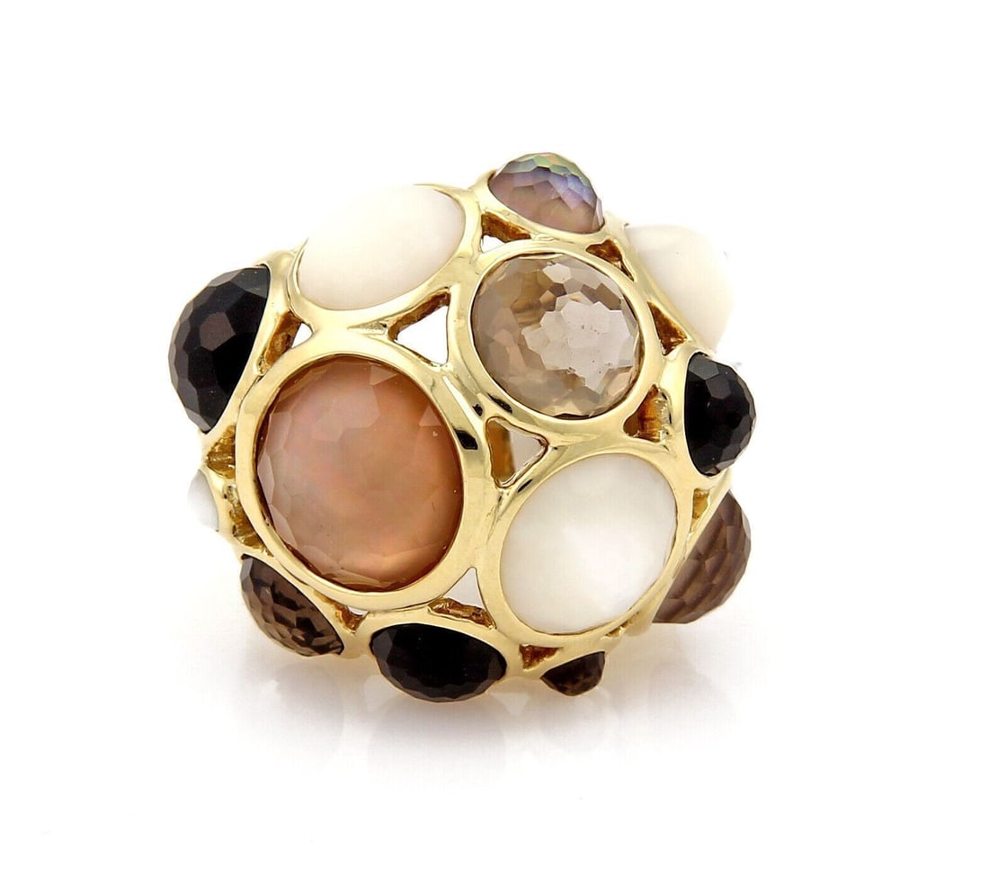 Ippolita Gelato 18k Gold Ring with Mother of Pearl Quartz Onyx Size 8.5: Ippolita Gelato 18k Gold Ring with Mother of Pearl Quartz Onyx Size 8.5 This Ippolita Gellato ring features a striking combination of mother of pearl, smoky quartz, and onyx gemstones set in luxurious