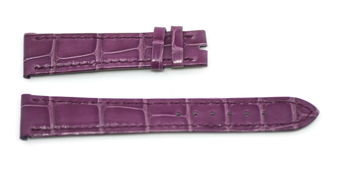Authentic Patek Philippe Purple Leather Strap 17mm Width: Authentic Patek Philippe Purple Leather Strap 17mm Width Elevate your timepiece with this authentic Patek Philippe purple leather strap, designed for elegance and comfort. This wristwatch band feature