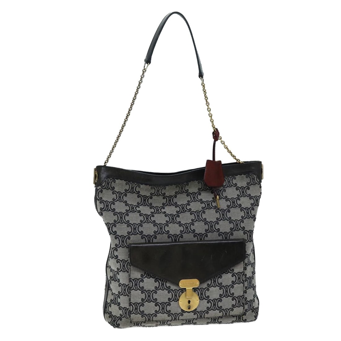 Vintage Triomphe Canvas Shoulder Bag in Gray by Celine: Vintage Triomphe Canvas Shoulder Bag in Gray by Celine This Celine Vintage Triomphe Shoulder Bag is crafted from gray canvas and features a classic shoulder bag silhouette. Designed for women, it incl