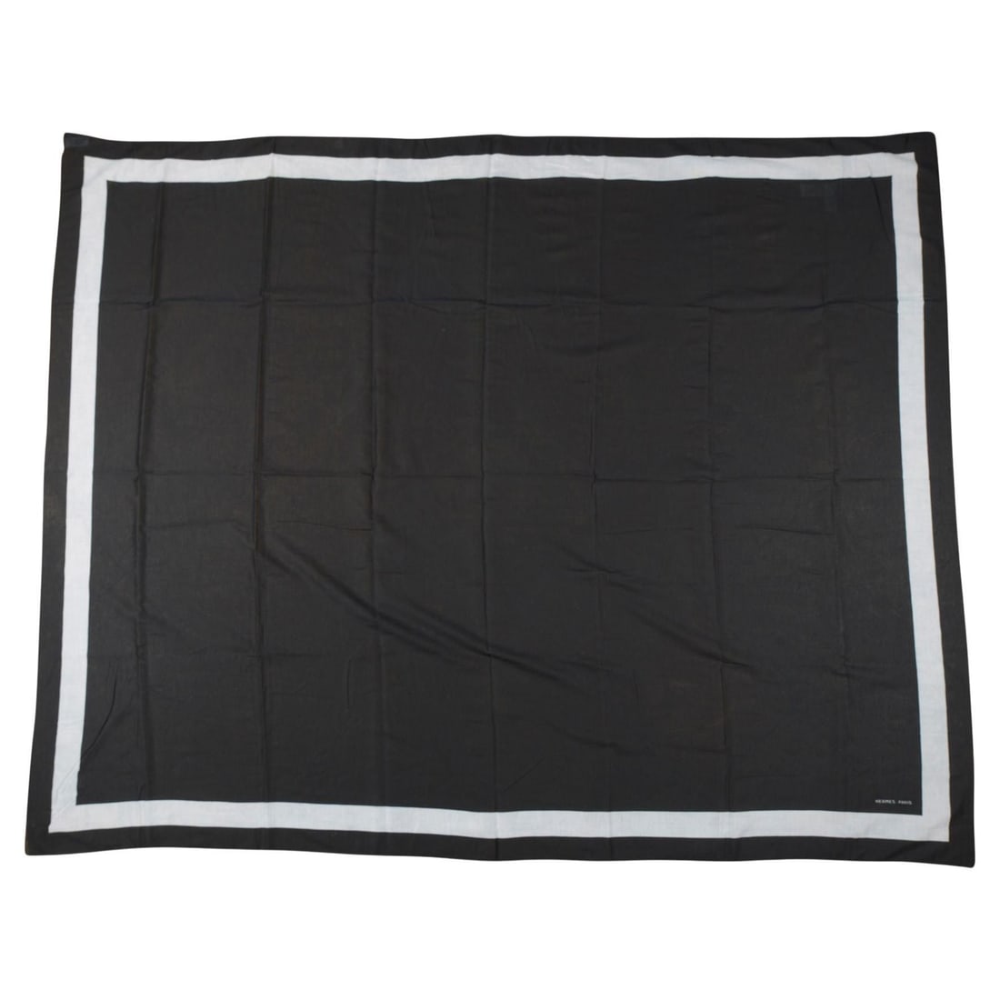 Black and White Cotton Sarong by Hermes with Care Tag: Black and White Cotton Sarong by Hermes with Care Tag This Hermes black and white sarong is crafted from 100% cotton, offering a stylish and chic accessory. The sarong features a care tag attached and
