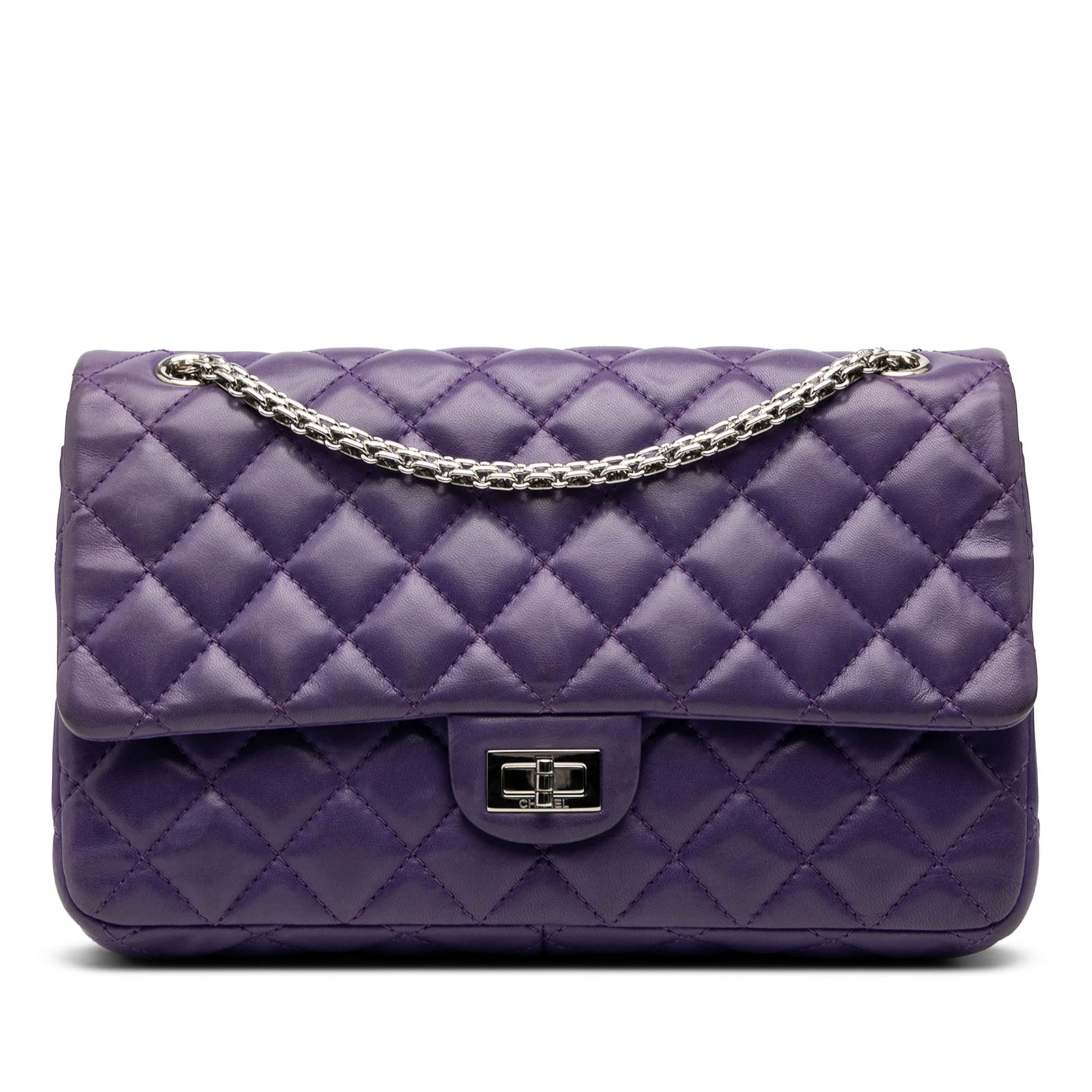 Chanel Reissue 2.55 Double Flap 226 Quilted Lambskin Shoulder Bag: Chanel Reissue 2.55 Double Flap 226 Quilted Lambskin Shoulder Bag This Chanel Reissue 2.55 Double Flap 226 shoulder bag is crafted from quilted lambskin leather in a striking purple color. It features