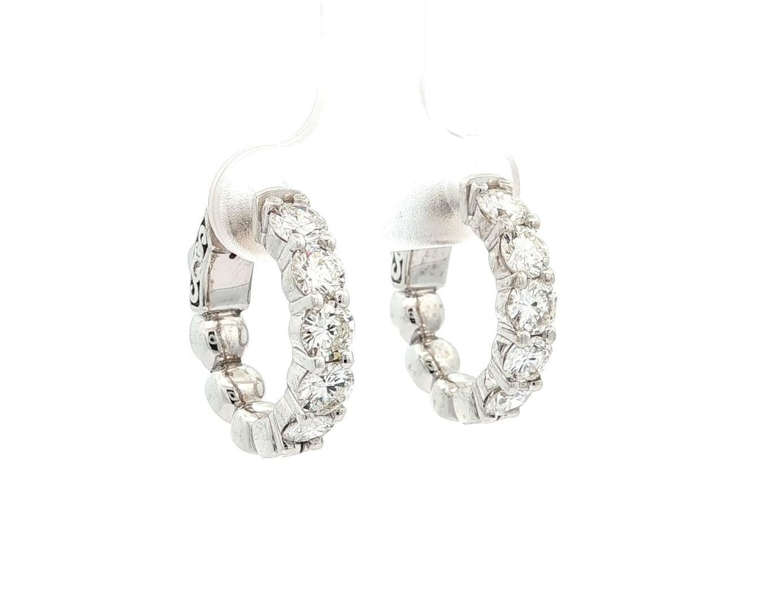 2.4ctw F VS Diamond Five-Stone 14k White Gold Huggie Hoop Earrings: 2.4ctw F VS Diamond Five-Stone 14k White Gold Huggie Hoop Earrings These elegant huggie hoop earrings feature five round brilliant cut natural diamonds on each earring, totaling approximately 2.4 cara