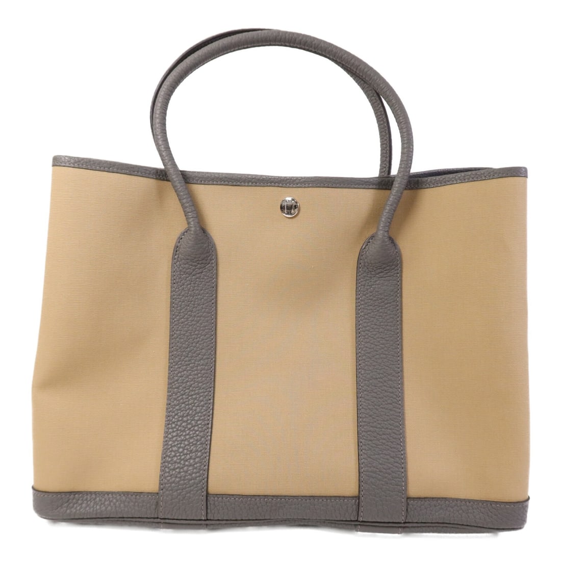 Hermes Garden Party TPM Canvas Tote in Beige and Gris Meyer with PHW: Hermes Garden Party TPM Canvas Tote in Beige and Gris Meyer with PHW This Hermes Garden Party TPM tote bag features a beige and Gris Meyer color scheme in durable canvas material. Made in France, it o
