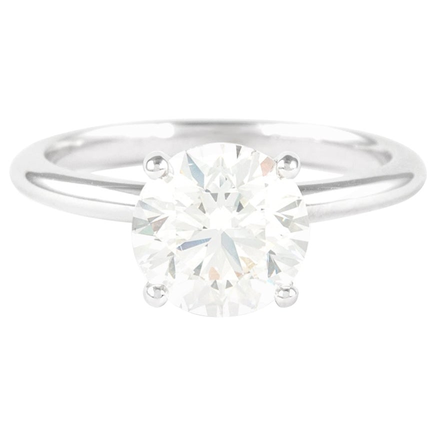 GIA 2.00ct Round Diamond Solitaire Ring 18K White Gold: GIA 2.00ct Round Diamond Solitaire Ring 18K White Gold This exquisite GIA-certified 2.00 ct Round Diamond Solitaire Ring is crafted in luxurious 18K white gold, showcasing a stunning round brilliant c