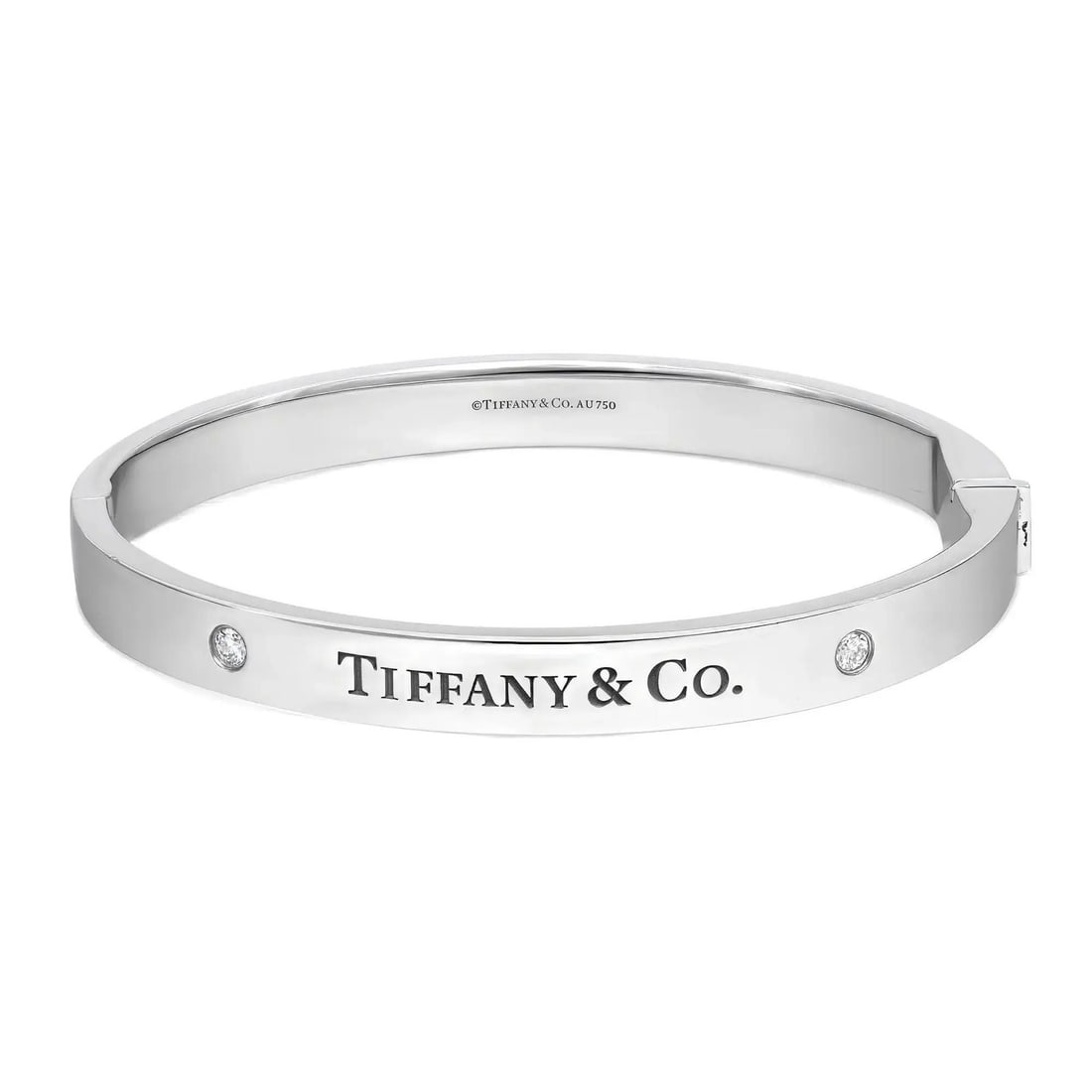 Tiffany & Co. Two Diamond Logo Bangle Bracelet 18K White Gold Engraved: Tiffany & Co. Two Diamond Logo Bangle Bracelet 18K White Gold Engraved This exquisite Tiffany & Co. Two Diamond Logo Hinged Bangle Bracelet is a stunning addition to any jewelry collection. Crafted fr