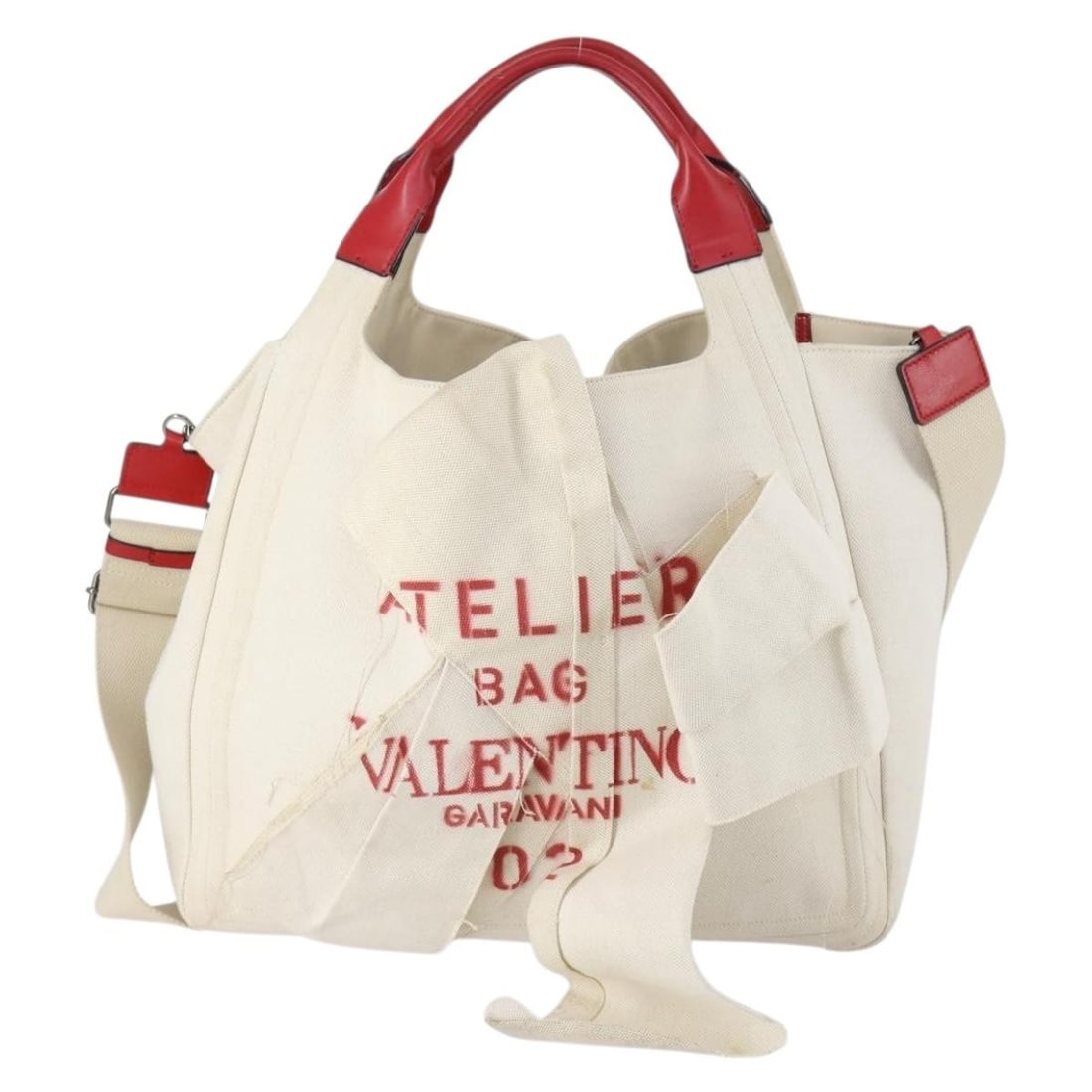 Valentino Garavani Atelier 02 White Canvas Tote Bag 38x32x14cm: Valentino Garavani Atelier 02 White Canvas Tote Bag 38x32x14cm Valentino Garavani Atelier 02 Tote is a female canvas tote bag in white. It features a spacious design suitable for everyday use. This pr