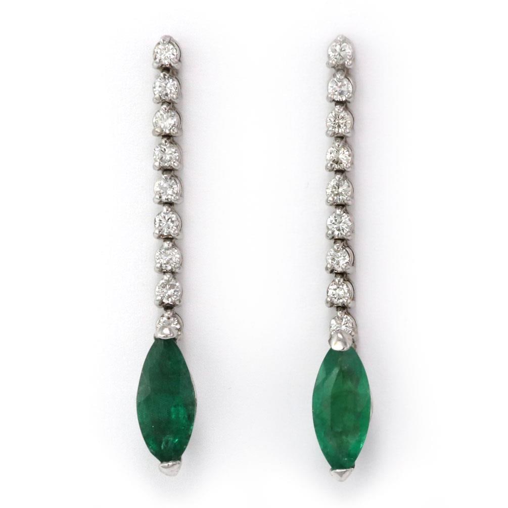 Vintage 14k White Gold Emerald Diamond Dangle Earrings 3 Carats: Vintage 14k White Gold Emerald Diamond Dangle Earrings 3 Carats Elevate your style with these exquisite vintage dangle earrings, expertly crafted from 14k white gold. Featuring nine round cut diamonds