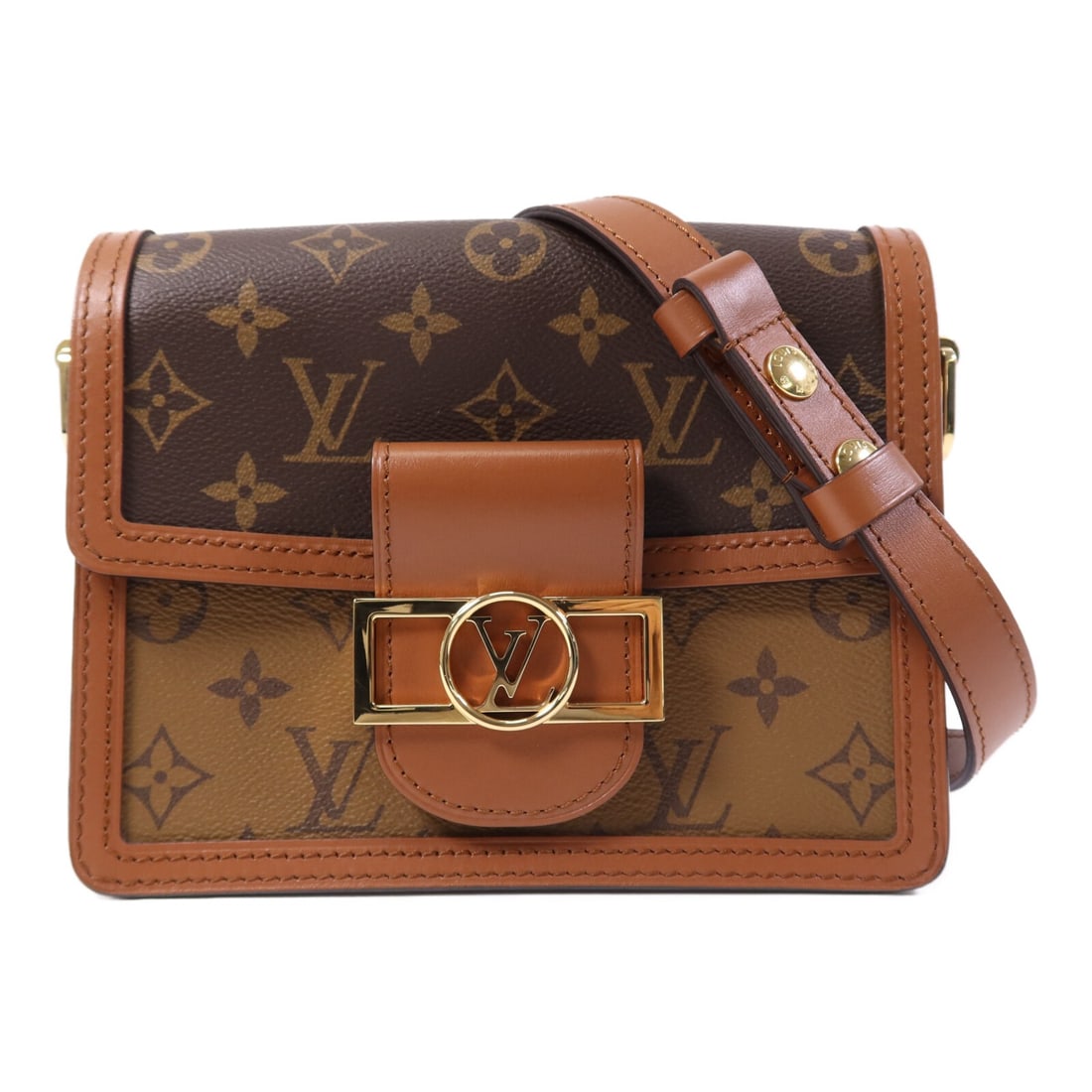 Louis Vuitton Mini Dauphine Monogram Reverse Brown Shoulder Bag M45959: Louis Vuitton Mini Dauphine Monogram Reverse Brown Shoulder Bag M45959 This Louis Vuitton Mini Dauphine shoulder bag features the classic Monogram Reverse pattern in brown PVC coated canvas. The compa