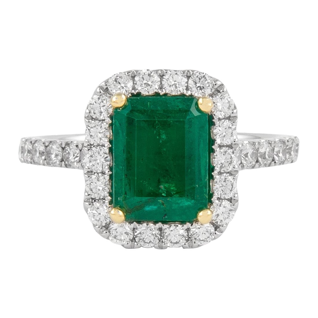 GIA Certified 2.42ct Emerald Diamond Halo Ring 18k Gold: GIA Certified 2.42ct Emerald Diamond Halo Ring 18k Gold This exquisite GIA certified halo ring features a stunning 1.71 carat emerald cut emerald surrounded by 30 round brilliant diamonds totaling 0.7