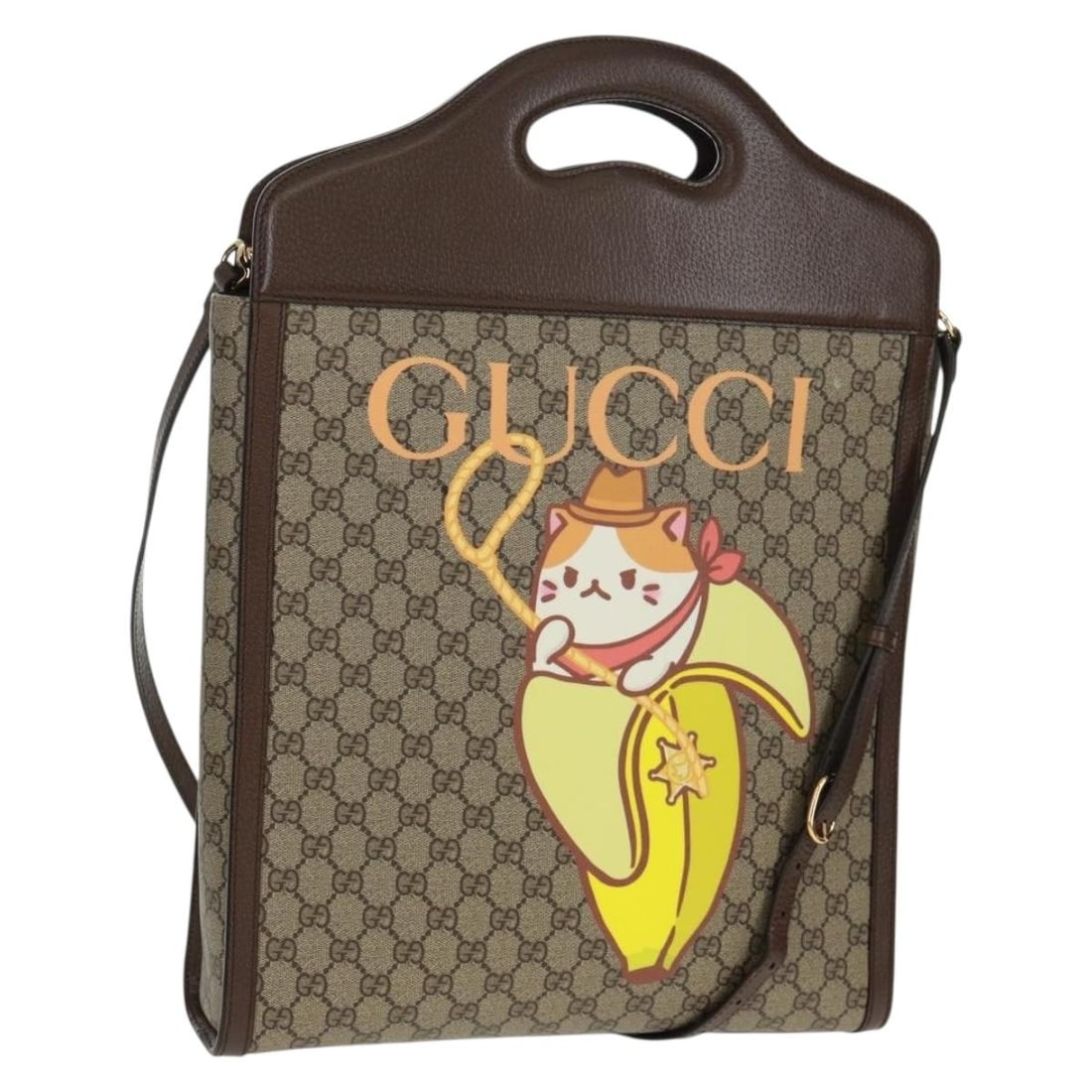 Bananya Collaboration 2way Beige GG Supreme Canvas Handbag by Gucci with Strap: Bananya Collaboration 2way Beige GG Supreme Canvas Handbag by Gucci with Strap This GUCCI GG Supreme Bananya Collaboration 2-way bag features a beige and gold GG canvas exterior and can be carried by