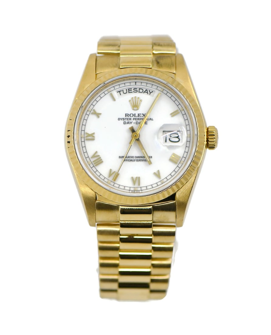Rolex Day-Date 18K Yellow Gold Automatic Watch 18038 with Box and Papers: Rolex Day-Date 18K Yellow Gold Automatic Watch 18038 with Box and Papers Experience timeless elegance with this pre-owned Rolex Day-Date wristwatch, crafted in luxurious 18K yellow gold. This classic