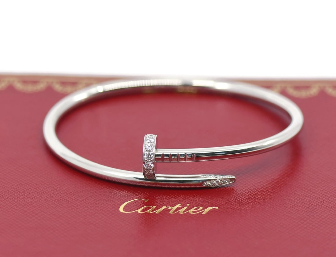 Cartier Juste Un Clou 18K White Gold Diamond Bracelet Authentic: Cartier Juste Un Clou 18K White Gold Diamond Bracelet Authentic Elevate your style with the Cartier Juste Un Clou Bracelet, a stunning piece from the renowned Cartier collection. Crafted from luxuriou