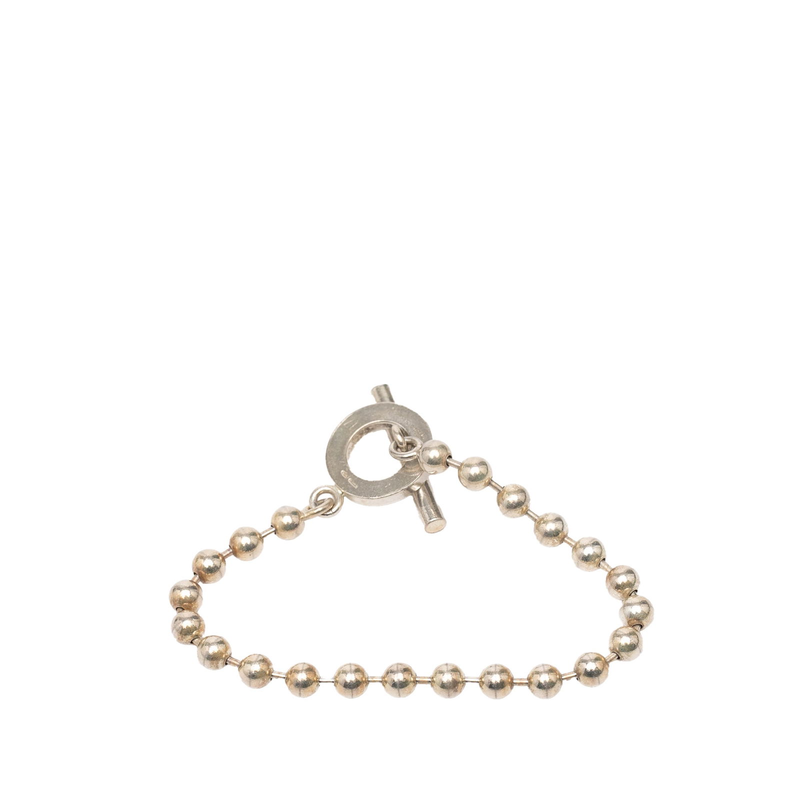 Gucci Sterling Silver Ball Chain Bracelet with Toggle Clasp: Gucci Sterling Silver Ball Chain Bracelet with Toggle Clasp This Gucci bracelet features a sterling silver ball chain design with a toggle closure. Made in Italy, the bracelet showcases a sleek silver