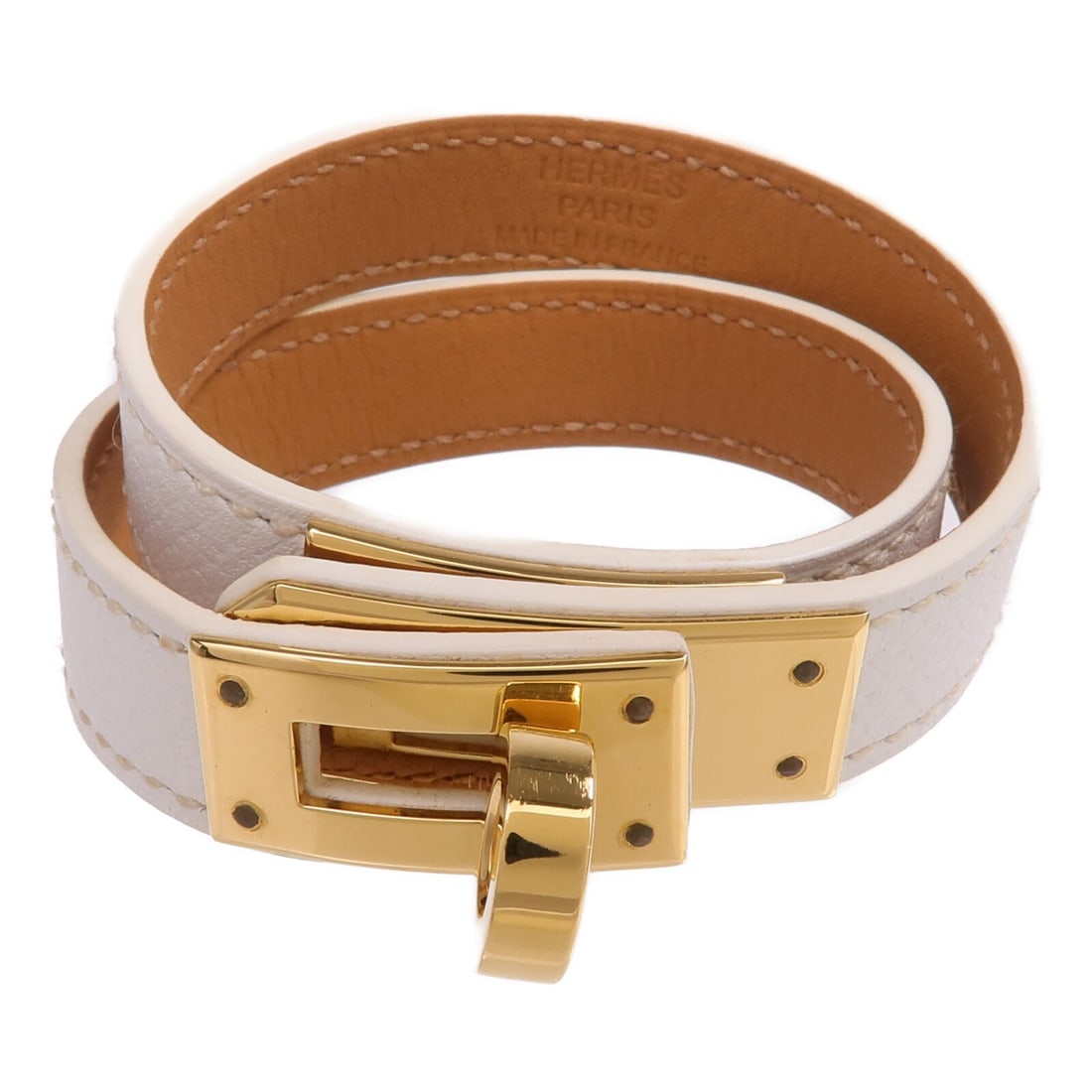 Hermes Kelly Double Tour White Epsom Leather Gold Hardware Bangle: Hermes Kelly Double Tour White Epsom Leather Gold Hardware Bangle This Hermes Kelly Double Tour bracelet features white Epsom calfskin leather in a bangle style. The bracelet is designed without any s