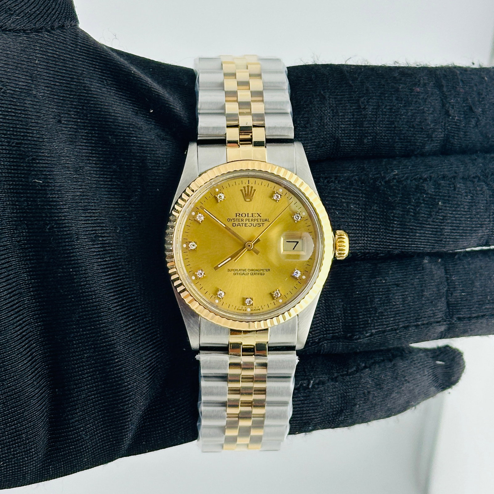 Datejust Ref 16013 Mens Watch Champagne Diamond Dial Aftermarket Jubilee Bracelet: Datejust Ref 16013 Mens Watch Champagne Diamond Dial Aftermarket Jubilee Bracelet This Rolex Datejust features a factory champagne diamond dial, fluted bezel, and an aftermarket Jubilee bracelet. It i