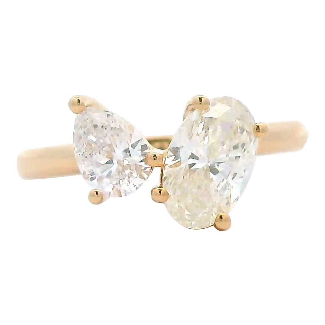 1.47ct Oval Pear Diamond Toi Et Moi Ring 18k Gold: 1.47ct Oval Pear Diamond Toi Et Moi Ring 18k Gold This exquisite 1.47ct Oval & Pear Diamond Toi Et Moi Ring is crafted from 18k yellow gold and features a contemporary design. It showcases a stunning