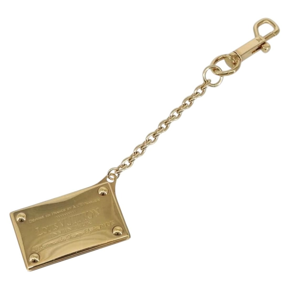Louis Vuitton Gold Metal Porte Cre Aventur Charm M95280 Made in France: Louis Vuitton Gold Metal Porte Cre Aventur Charm M95280 Made in France This stylish Louis Vuitton Porte Cre Aventur Charm is a stunning accessory crafted from durable metal in a luxurious gold finish.
