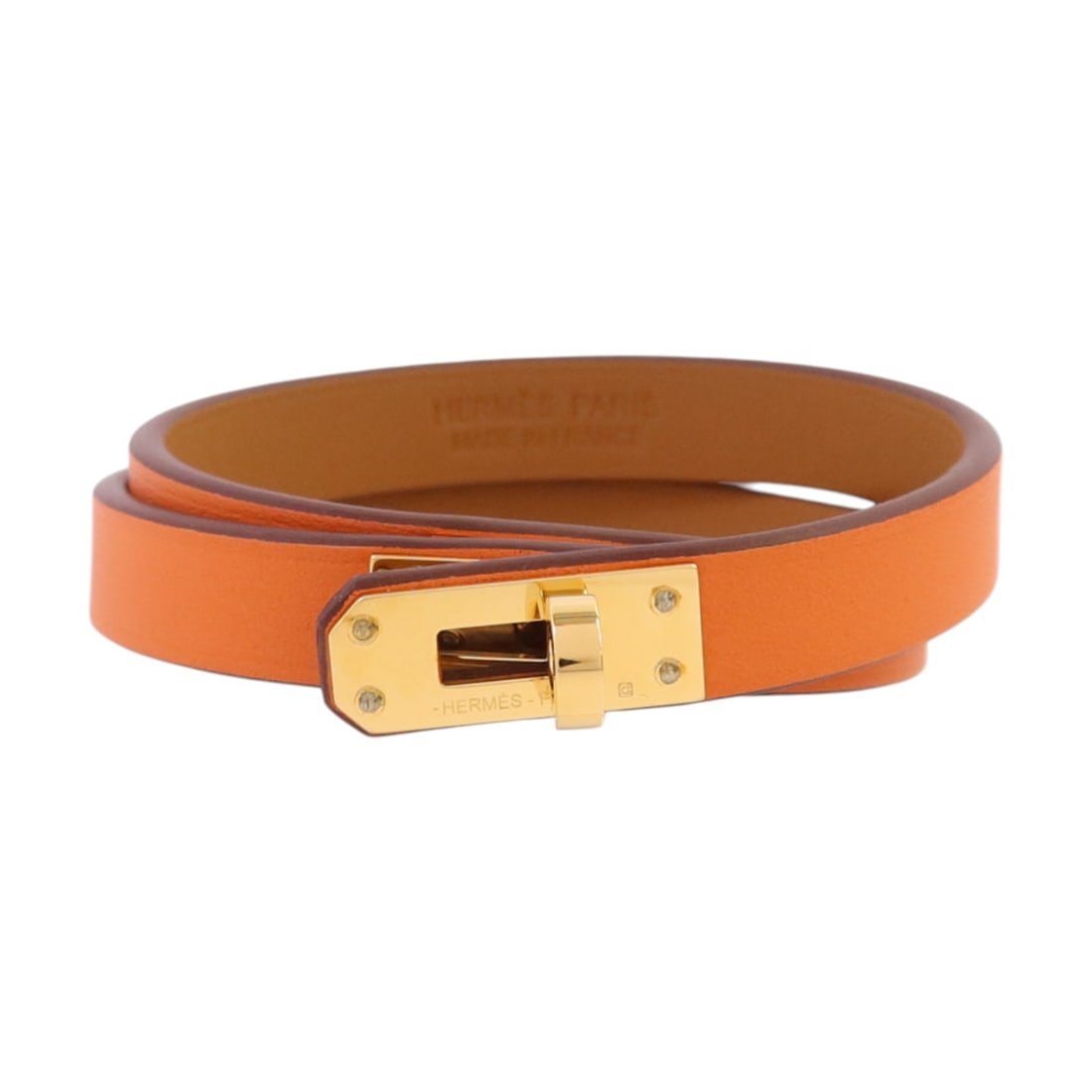 Mini Kelly Double Tour Orange Bracelet by Hermes in Swift Leather with GHW: Mini Kelly Double Tour Orange Bracelet by Hermes in Swift Leather with GHW This Hermes Mini Kelly Double Tour bracelet is crafted from Swift calfskin leather in an orange hue. The design features a do