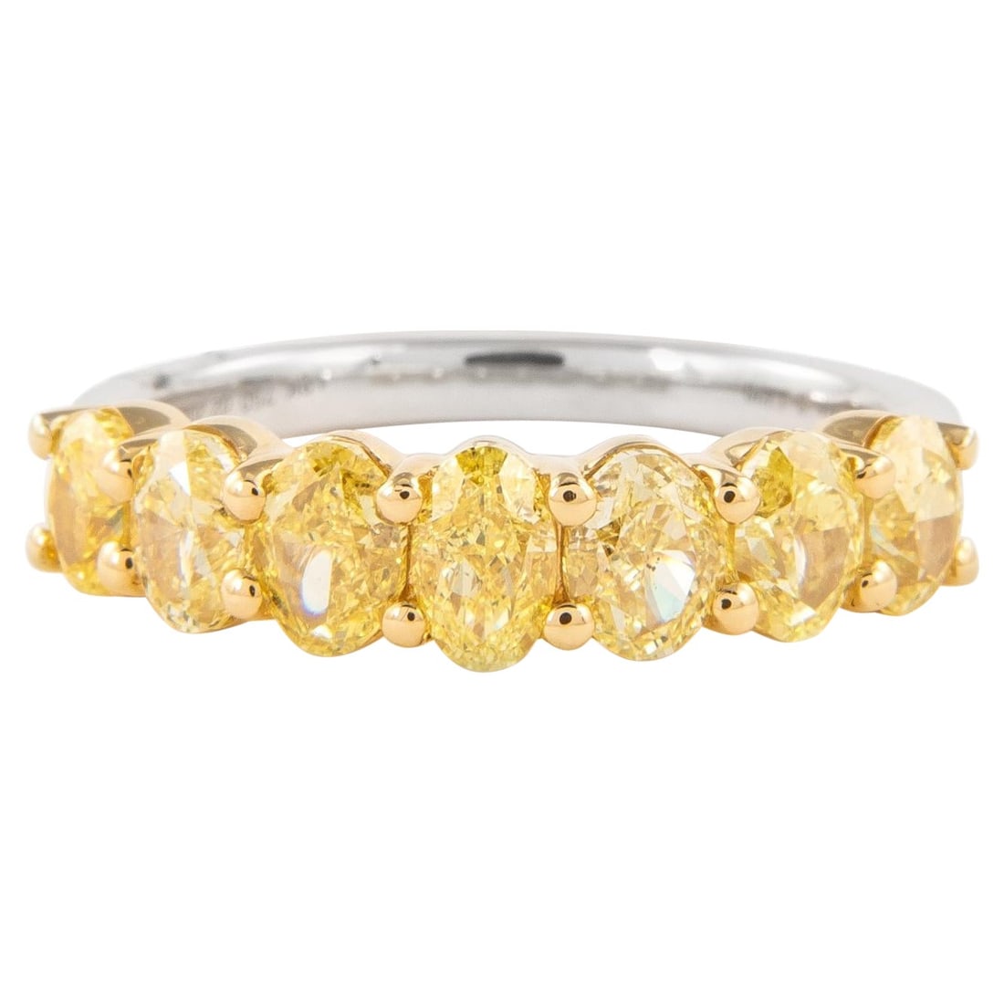 2.20ct Fancy Yellow Oval Diamond Half Eternity Ring: 2.20ct Fancy Yellow Oval Diamond Half Eternity Ring This exquisite half eternity band features a stunning arrangement of seven oval diamonds totaling 2.20 carats. The diamonds exhibit an approximately