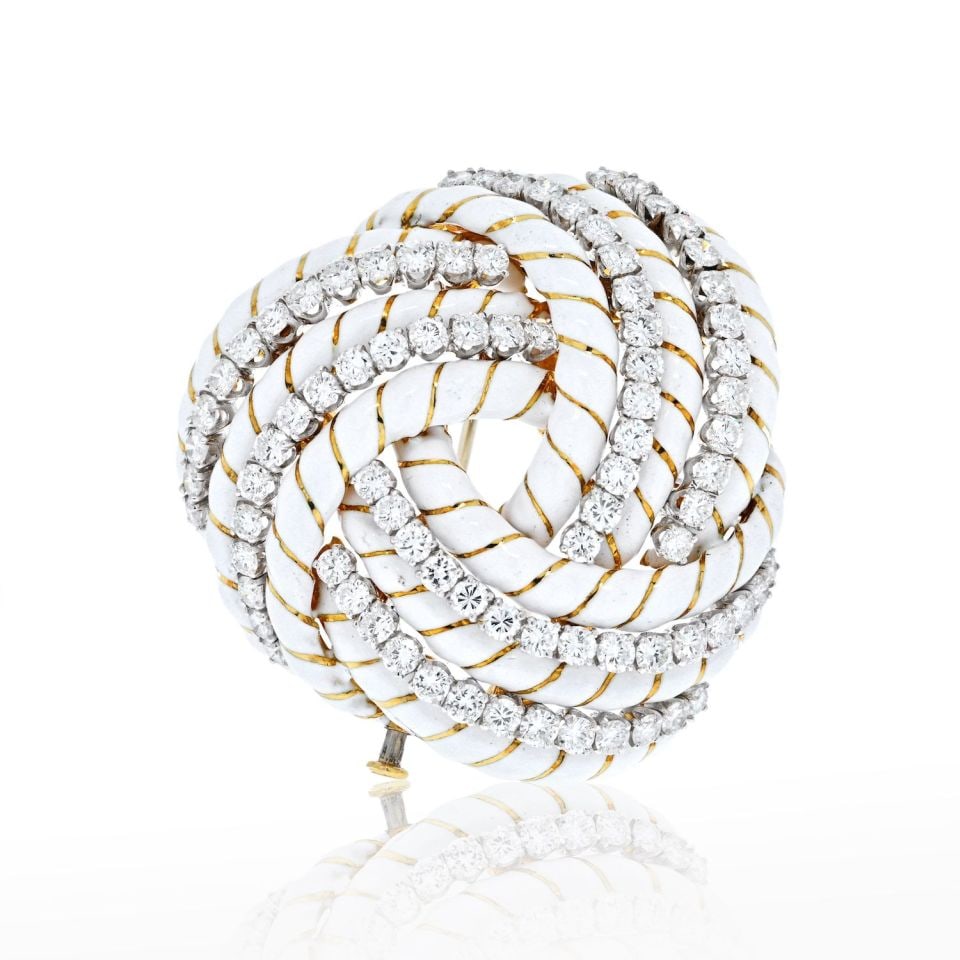 David Webb 18K Yellow Gold Platinum Diamond Knot Brooch 8.00ct: David Webb 18K Yellow Gold Platinum Diamond Knot Brooch 8.00ct This stunning brooch features a beautiful knot design crafted from a combination of 18K yellow gold and platinum, complemented by white e