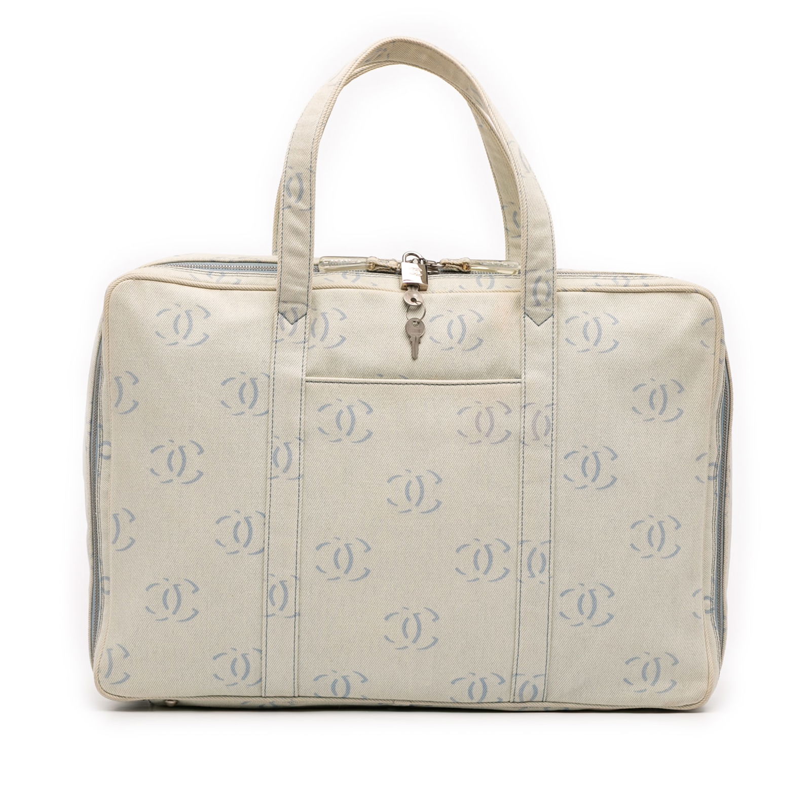 Chanel CC Denim Travel Bag Blue Fabric Italy: Chanel CC Denim Travel Bag Blue Fabric Italy The Chanel CC Denim Travel Bag showcases a stylish denim body, complemented by flat denim top handles for comfortable carrying. This versatile bag features