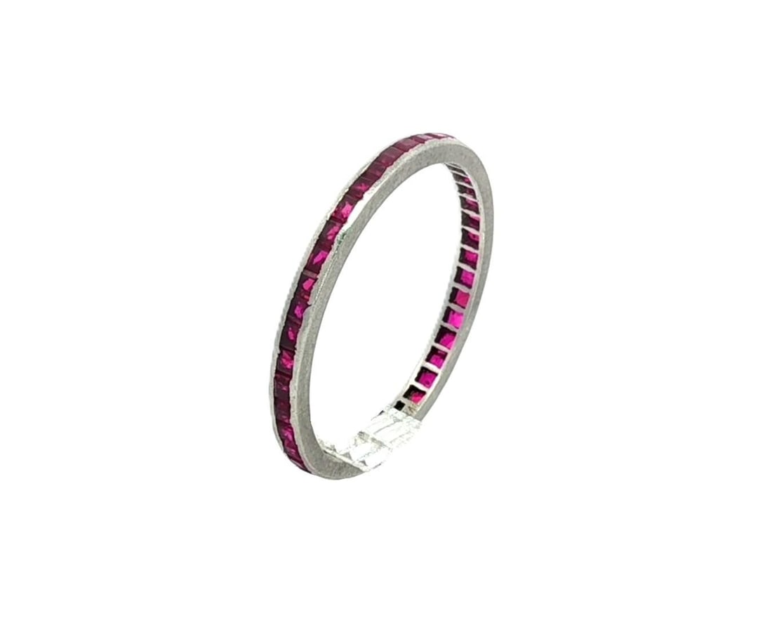 Tiffany & Co. Platinum Ruby Eternity Band Ring Square Cut: Tiffany & Co. Platinum Ruby Eternity Band Ring Square Cut This exquisite Tiffany & Co. Platinum Square Step Cut Channel Set Ruby Eternity Band Ring is a stunning piece crafted for elegance and durabil