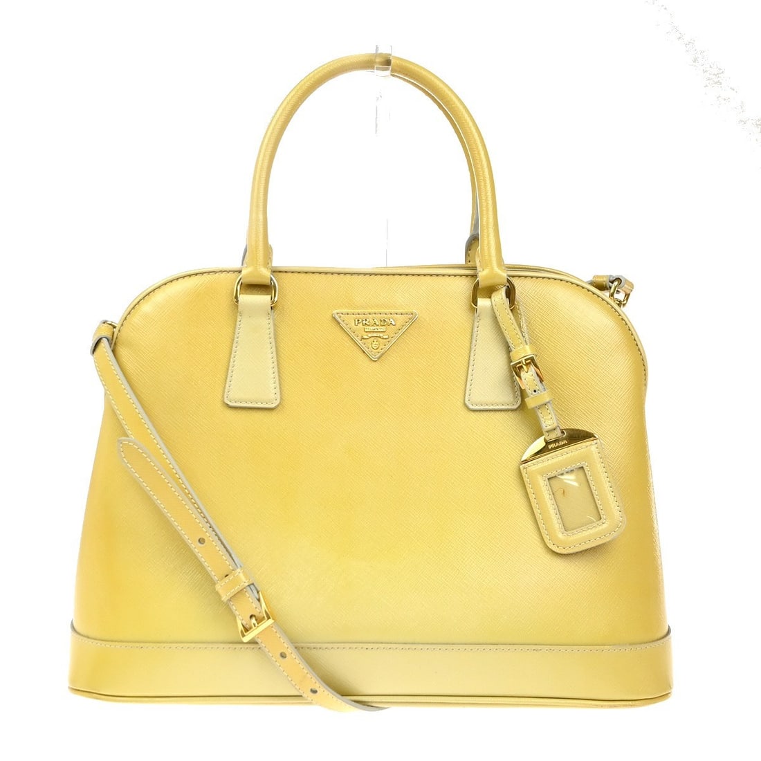 Prada Yellow Saffiano Leather Open Promenade Handbag 34cm by 25cm: Prada Yellow Saffiano Leather Open Promenade Handbag 34cm by 25cm This Prada Open Promenade bag features saffiano leather in a vibrant yellow color, designed for women. It offers a stylish and practic
