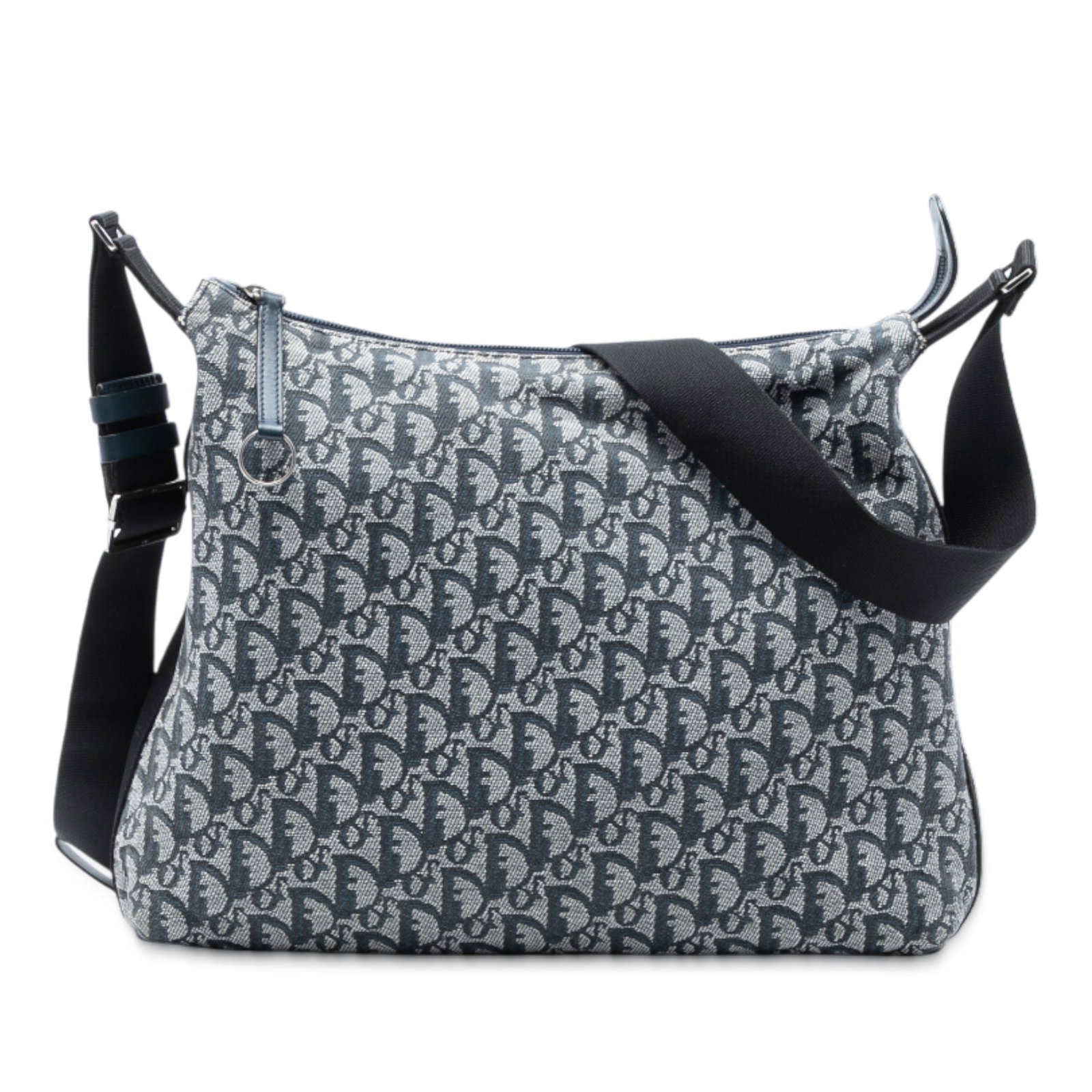 Dior Diorissimo Trotter Pattern Blue Canvas Shoulder Bag with Zip Closure: Dior Diorissimo Trotter Pattern Blue Canvas Shoulder Bag with Zip Closure This Diorissimo Trotter Canvas Crossbody bag features a blue canvas exterior with an adjustable flat shoulder strap, a top zip