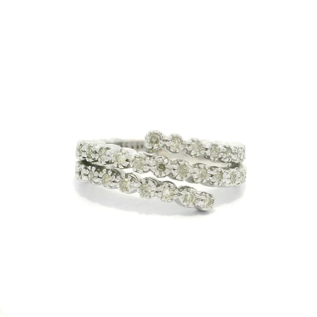 14k White Gold 0.37ct Diamond Wrap Style Band Ring: 14k White Gold 0.37ct Diamond Wrap Style Band Ring This stunning 14k White Gold band ring features a wrap style design adorned with 37 natural round brilliant cut diamonds, totaling approximately 0.37