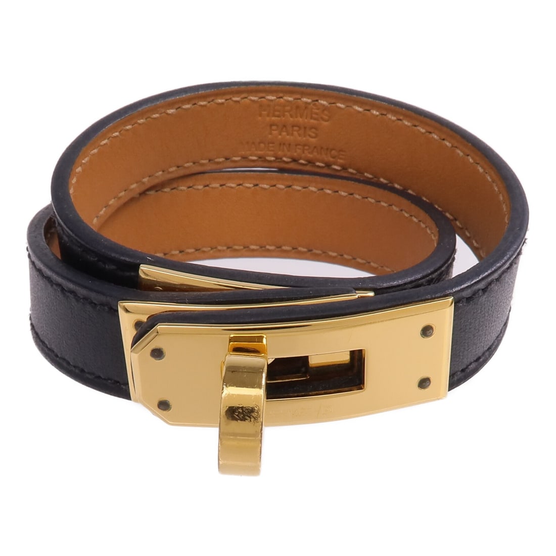 Kelly Double Bangle Black Chamonix Leather Gold Hardware by Hermes: Kelly Double Bangle Black Chamonix Leather Gold Hardware by Hermes This Hermes Kelly Double Bracelet features a sleek black Chamonix calfskin leather design. Styled as a bangle, it showcases classic e