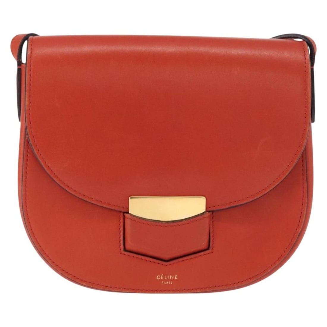 Celine Trotteur Orange Leather Crossbody Bag for Women: Celine Trotteur Orange Leather Crossbody Bag for Women This Celine Trotteur Crossbody Bag is crafted from orange calfskin leather and designed for women. The bag features a compact silhouette with a s