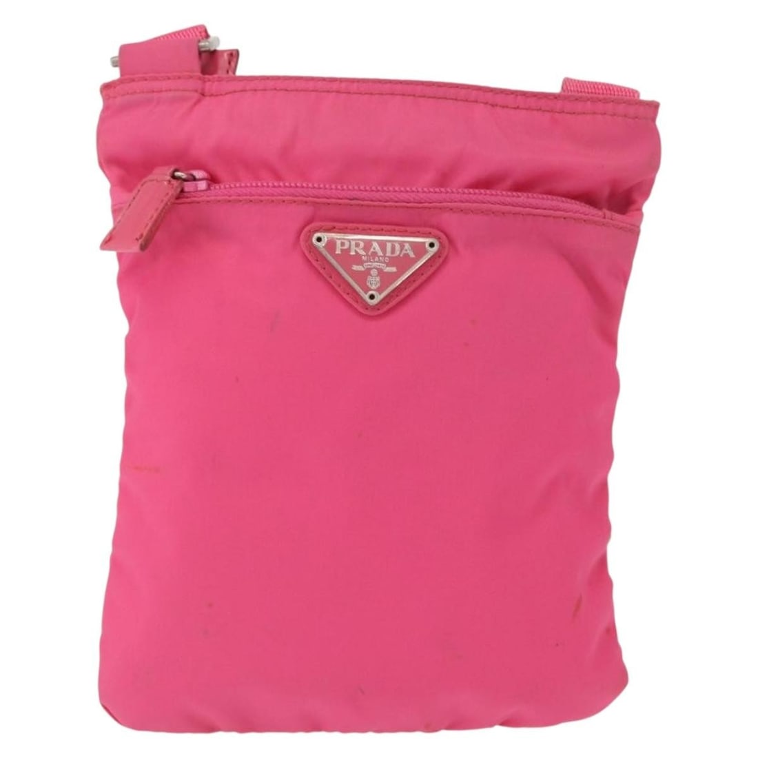 Prada Pink Nylon Female Messenger Bag with Front Pocket: Prada Pink Nylon Female Messenger Bag with Front Pocket This Prada Front Pocket Messenger Bag for women features a pink nylon exterior and a practical front pocket design. It shows signs of wear inclu