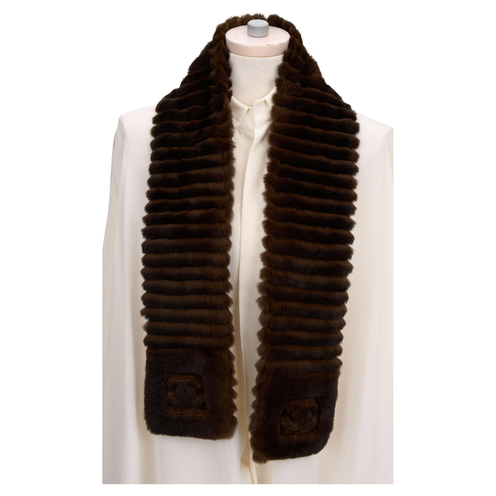 Chanel Brown Orylag Rabbit Fur Scarf with CC Logos: Chanel Brown Orylag Rabbit Fur Scarf with CC Logos Elevate your accessory collection with this exquisite Chanel scarf, crafted from a luxurious blend of 70% Orylag rabbit fur and 30% cashmere for ulti