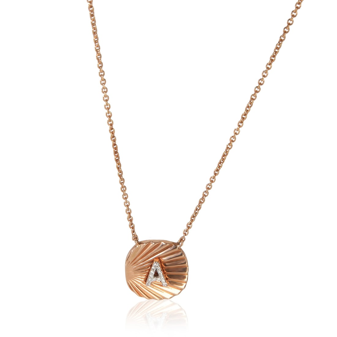 14K Rose Gold Pendant with Diamond Initial A Oval Tag Design: 14K Rose Gold Pendant with Diamond Initial A Oval Tag Design This 14K rose gold pendant features a white round brilliant diamond in an oval tag design, showcasing the letter 'A'. The pendant is pre-ow