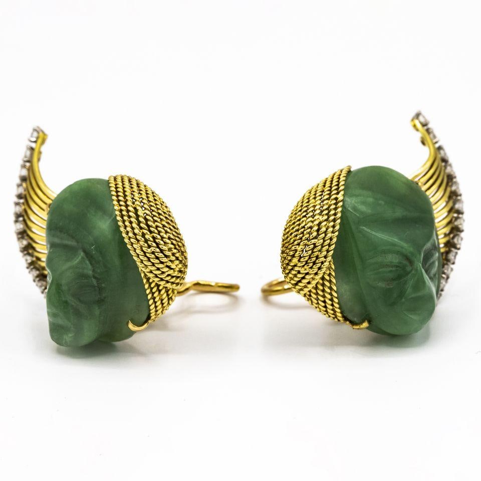 Vintage French Platinum 18K Yellow Gold Jade Face Earrings: Vintage French Platinum 18K Yellow Gold Jade Face Earrings Discover the elegance of these vintage French clip-on earrings, expertly crafted in a combination of platinum and 18K yellow gold. Each earri
