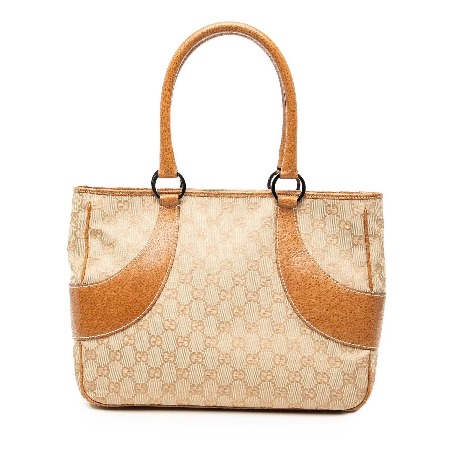 Brown Gucci GG Canvas Tote with Leather Trim and Magnetic Closure: Brown Gucci GG Canvas Tote with Leather Trim and Magnetic Closure This Gucci GG Canvas Tote features a canvas body with leather trim and rolled leather straps. The open top is secured with a magnetic