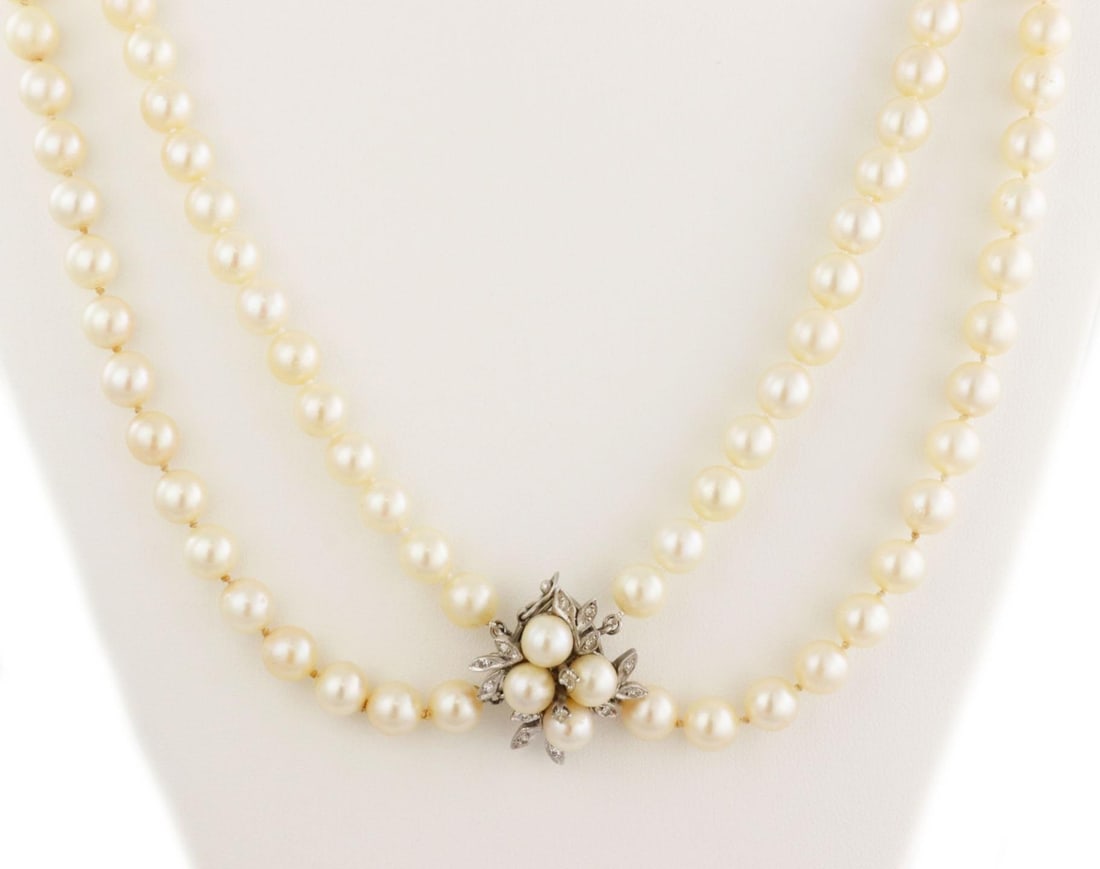 Vintage Double Strand Pearl Necklace 14k White Gold with Diamonds: Vintage Double Strand Pearl Necklace 14k White Gold with Diamonds This exquisite vintage necklace showcases a stunning double strand of creamy cultured pearls, each measuring approximately 8mm. The st