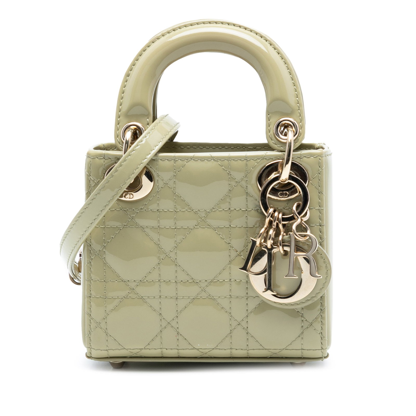 Dior Lady Dior Micro Green Patent Cannage Leather Bag With Strap: Dior Lady Dior Micro Green Patent Cannage Leather Bag With Strap This Lady Dior Micro Patent Cannage handbag features a quilted patent leather body in green, flat top handles, a detachable flat leathe