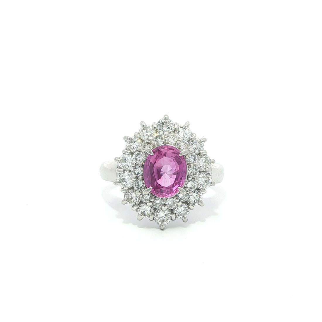Platinum Cluster Ring with GIA Ceylon Pink Sapphire and Diamond Dual Halo: Platinum Cluster Ring with GIA Ceylon Pink Sapphire and Diamond Dual Halo This platinum cocktail ring features a 1.36 carat natural Ceylon pink sapphire, certified by GIA, set in an oval brilliant cut