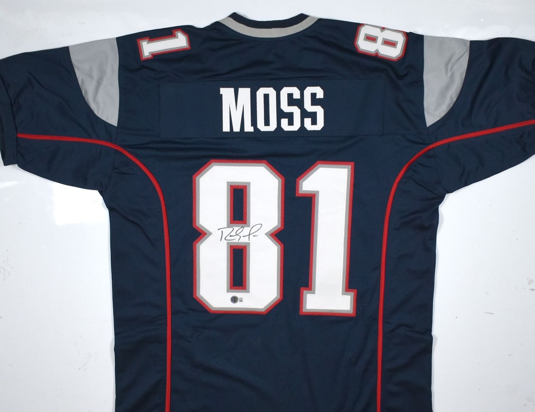 Randy Moss Autographed New England Patriots Jersey Beckett Authenticated: Randy Moss Autographed New England Patriots Jersey Beckett Authenticated This original Randy Moss autographed blue pro style jersey is a must-have for any football enthusiast. Showcasing the legendary